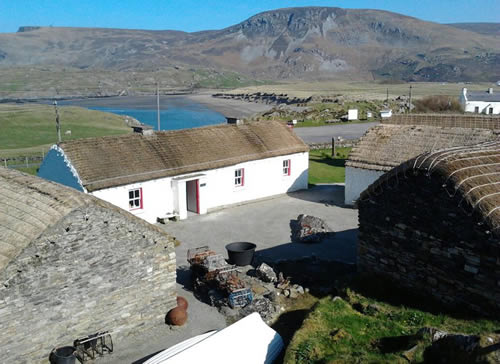 Folk Village with view of Glen Head, Glencolmcille, County Donegal